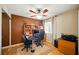 Bedroom features a ceiling fan, work space, and natural lighting at 419 Alonzo Ct, Las Vegas, NV 89123