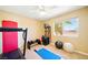 Exercise room features a treadmill, weight rack, and plenty of floor space at 419 Alonzo Ct, Las Vegas, NV 89123