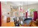 Open-concept great room with bar seating, high ceilings, and staircase at 419 Alonzo Ct, Las Vegas, NV 89123