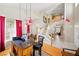 Sun-filled great room with bar seating, staircase, and dining area at 419 Alonzo Ct, Las Vegas, NV 89123