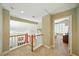 Hallway leading to bedroom, with railing overlooking main level at 419 Alonzo Ct, Las Vegas, NV 89123