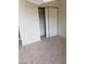 Bedroom with sliding closet doors, carpet, and lots of room at 4231 White Sands Ave, Las Vegas, NV 89121