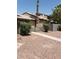 Inviting home with a neutral-toned exterior, a quaint, fenced yard, and easy to maintain landscaping at 4231 White Sands Ave, Las Vegas, NV 89121