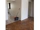 Spacious living room with wood flooring and tile leading to a hallway at 4231 White Sands Ave, Las Vegas, NV 89121