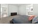 Comfortable bedroom features neutral carpet, plantation shutters and access to an ensuite bathroom at 424 Vigo Port St, Las Vegas, NV 89138
