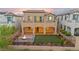 Beautiful backyard with a fire pit, turfed putting green, and covered patio, perfect for outdoor enjoyment at 424 Vigo Port St, Las Vegas, NV 89138