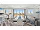 Open concept living room with wood floors, dining table, and large windows showing scenic views at 424 Vigo Port St, Las Vegas, NV 89138