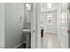 Powder room featuring a pedestal sink, open to a laundry room for added convenience at 424 Vigo Port St, Las Vegas, NV 89138