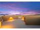 Rooftop deck featuring a built-in fireplace and panoramic views during sunset at 424 Vigo Port St, Las Vegas, NV 89138