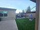 Backyard with a covered carport, offering versatile outdoor space at 4242 Helena Hideaway Ct, Las Vegas, NV 89129