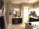 Spacious bathroom featuring vanity, soaking tub, and a walk-in shower at 4242 Helena Hideaway Ct, Las Vegas, NV 89129