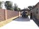 Wide driveway with carport to store your boat at 4242 Helena Hideaway Ct, Las Vegas, NV 89129
