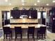 Bright kitchen with granite countertops, a large island, and stainless steel appliances at 4242 Helena Hideaway Ct, Las Vegas, NV 89129