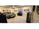 Large main bedroom features neutral carpet, a large bed, dual nightstands and recessed lighting at 4242 Helena Hideaway Ct, Las Vegas, NV 89129