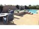 Relaxing backyard pool and spa with a cozy seating area for enjoying the outdoors at 4242 Helena Hideaway Ct, Las Vegas, NV 89129