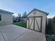 Backyard with a shed and covered carport, offering versatile outdoor space at 4242 Helena Hideaway Ct, Las Vegas, NV 89129