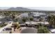 Community aerial view highlighting a mix of residential and commercial properties, and distant mountains at 45 N Lamb Blvd, Las Vegas, NV 89110