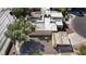 Overhead view features a flat roof, car port, and desert landscaping for a low-maintenance yard at 45 N Lamb Blvd, Las Vegas, NV 89110