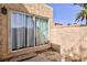 Backyard featuring sliding glass doors to the house, a patio and xeriscape landscaping at 45 N Lamb Blvd, Las Vegas, NV 89110