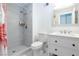 Stylish bathroom features a walk-in shower with a modern showerhead and a sleek white vanity at 45 N Lamb Blvd, Las Vegas, NV 89110