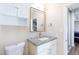 Bathroom with granite countertop vanity and framed mirror, offering a stylish and functional space at 45 N Lamb Blvd, Las Vegas, NV 89110