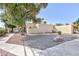 Exterior showcasing a desert landscaped front yard and stucco home at 45 N Lamb Blvd, Las Vegas, NV 89110