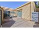 Private patio area with sliding glass doors, textured walls, and ample space at 45 N Lamb Blvd, Las Vegas, NV 89110