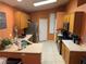 Functional kitchen with wood cabinets, stainless steel appliances, and a breakfast bar at 4636 Ferrell St, North Las Vegas, NV 89031
