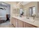 Bathroom featuring double sinks, ample counter space, and neutral tones at 467 Beardsley Cir, Henderson, NV 89052