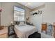 Bedroom featuring a large window, ceiling fan and sliding door closet at 467 Beardsley Cir, Henderson, NV 89052