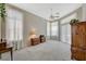 Bright bedroom with large windows and elegant furniture at 467 Beardsley Cir, Henderson, NV 89052
