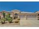 Charming single-story home with desert landscaping and a spacious three-car garage at 467 Beardsley Cir, Henderson, NV 89052