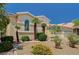 Well-maintained desert landscaping enhances this single-story home's curb appeal at 467 Beardsley Cir, Henderson, NV 89052