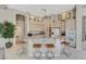 Spacious kitchen with breakfast bar, neutral cabinets, and modern appliances at 467 Beardsley Cir, Henderson, NV 89052