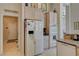 Kitchen with a stainless steel refrigerator and modern appliances at 467 Beardsley Cir, Henderson, NV 89052