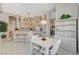 Bright kitchen with a breakfast bar, casual dining area, and ample cabinet space at 467 Beardsley Cir, Henderson, NV 89052