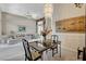 Cozy living room with plush seating, a ceiling fan, and elegant decor at 467 Beardsley Cir, Henderson, NV 89052