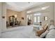 Open-concept living space with formal dining area and comfortable seating arrangements at 467 Beardsley Cir, Henderson, NV 89052