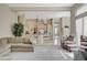 Spacious living room with seamless flow to the kitchen and dining area at 467 Beardsley Cir, Henderson, NV 89052