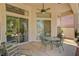 Covered patio with comfortable seating, perfect for outdoor relaxation at 467 Beardsley Cir, Henderson, NV 89052