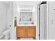 Bathroom vanity with drawers and a mirror at 4735 Madrigal Way, Las Vegas, NV 89122