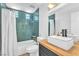 Bathroom featuring tiled shower and modern sink at 4735 Madrigal Way, Las Vegas, NV 89122