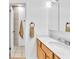 Clean bathroom with a wood vanity and sink at 4735 Madrigal Way, Las Vegas, NV 89122