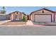 Charming single-story home with a two-car garage and low-maintenance landscaping at 4735 Madrigal Way, Las Vegas, NV 89122