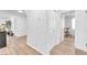 Hallway with wood flooring and access to bedrooms at 4735 Madrigal Way, Las Vegas, NV 89122