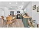 Charming kitchen features white cabinets, stainless steel appliances, and natural light at 4735 Madrigal Way, Las Vegas, NV 89122