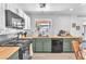 Well-lit kitchen with stainless steel appliances, butcher block countertops, and subway tile backsplash at 4735 Madrigal Way, Las Vegas, NV 89122