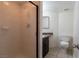 Bathroom featuring a sliding glass door shower and toilet at 499 Kristin Ln, Henderson, NV 89011