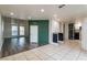 Large open-concept living space connects living, dining, and kitchen areas, enhanced by natural light at 499 Kristin Ln, Henderson, NV 89011