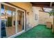 Outdoor patio includes a covered area with a green floor at 499 Kristin Ln, Henderson, NV 89011